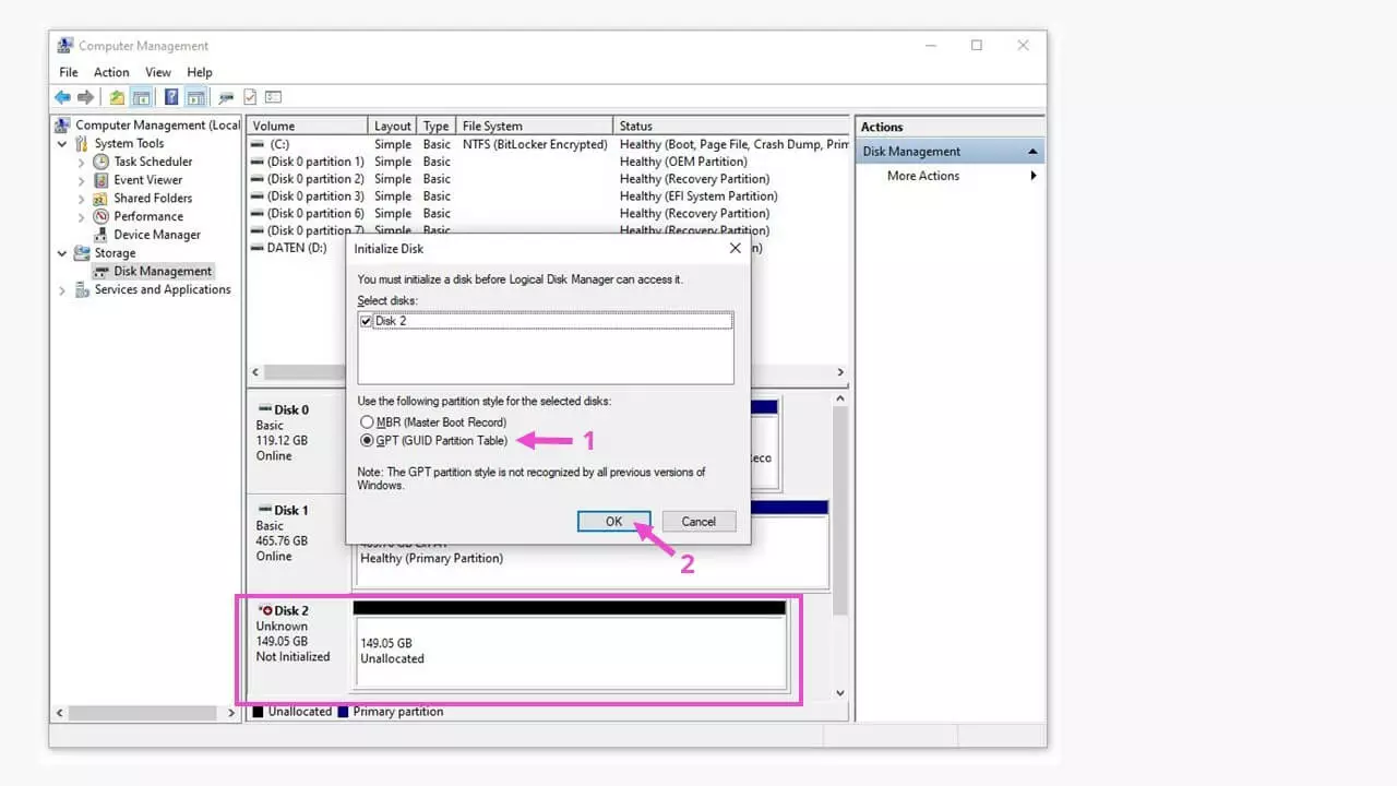 Dans l’initialisation du disque, laissez le style de partition préparamétré sur GPT (1) et validez avec « OK » (2).